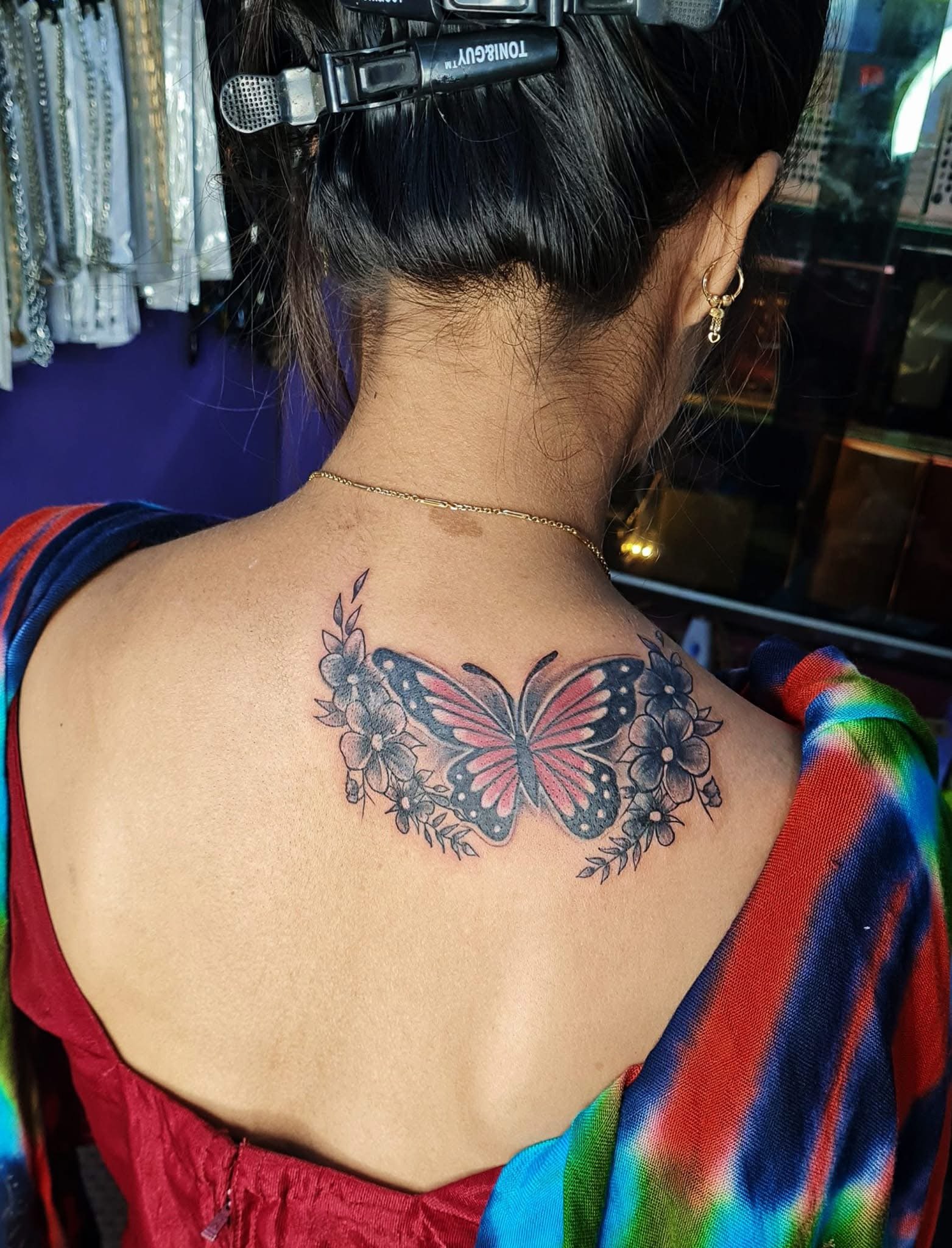 Artist tattooing detail
